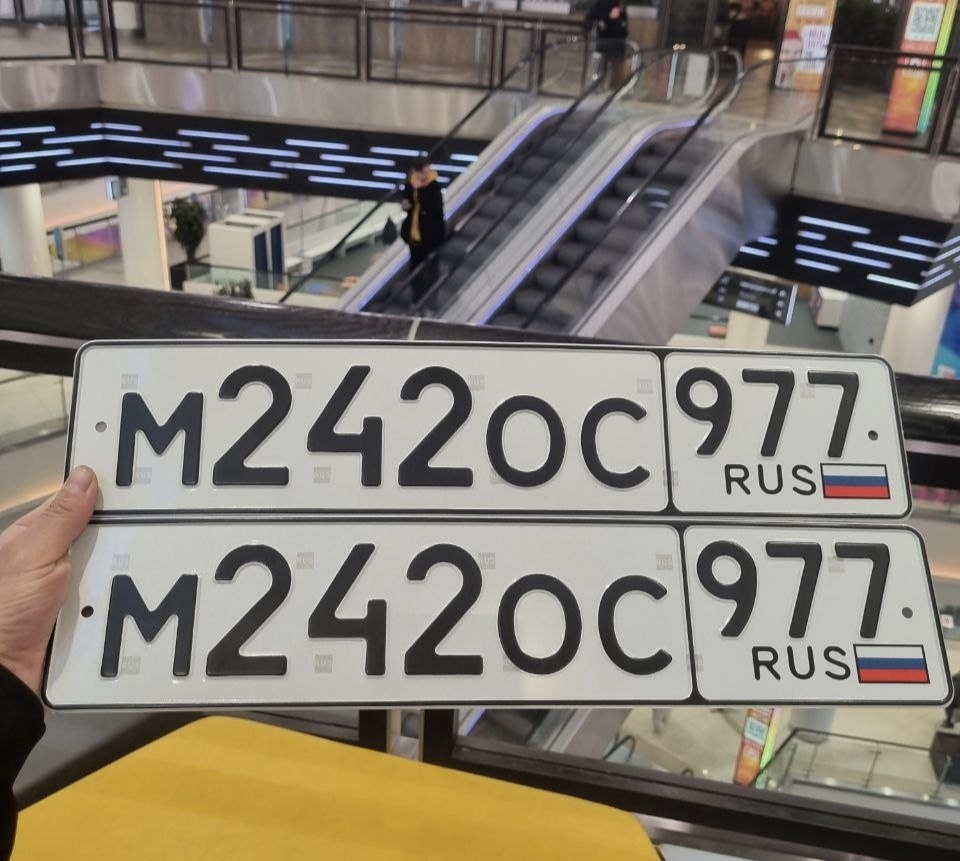 Номер М 242 ОС 977